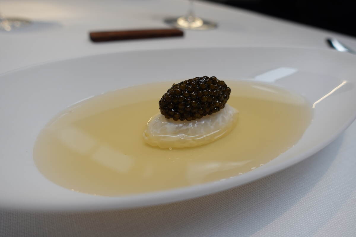 Cured squid, poultry consommé and caviar