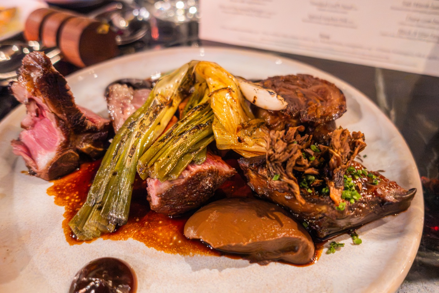Salt Marsh lamb T-bone. Roasted miso aubergine, pickled onion, braised shoulder.