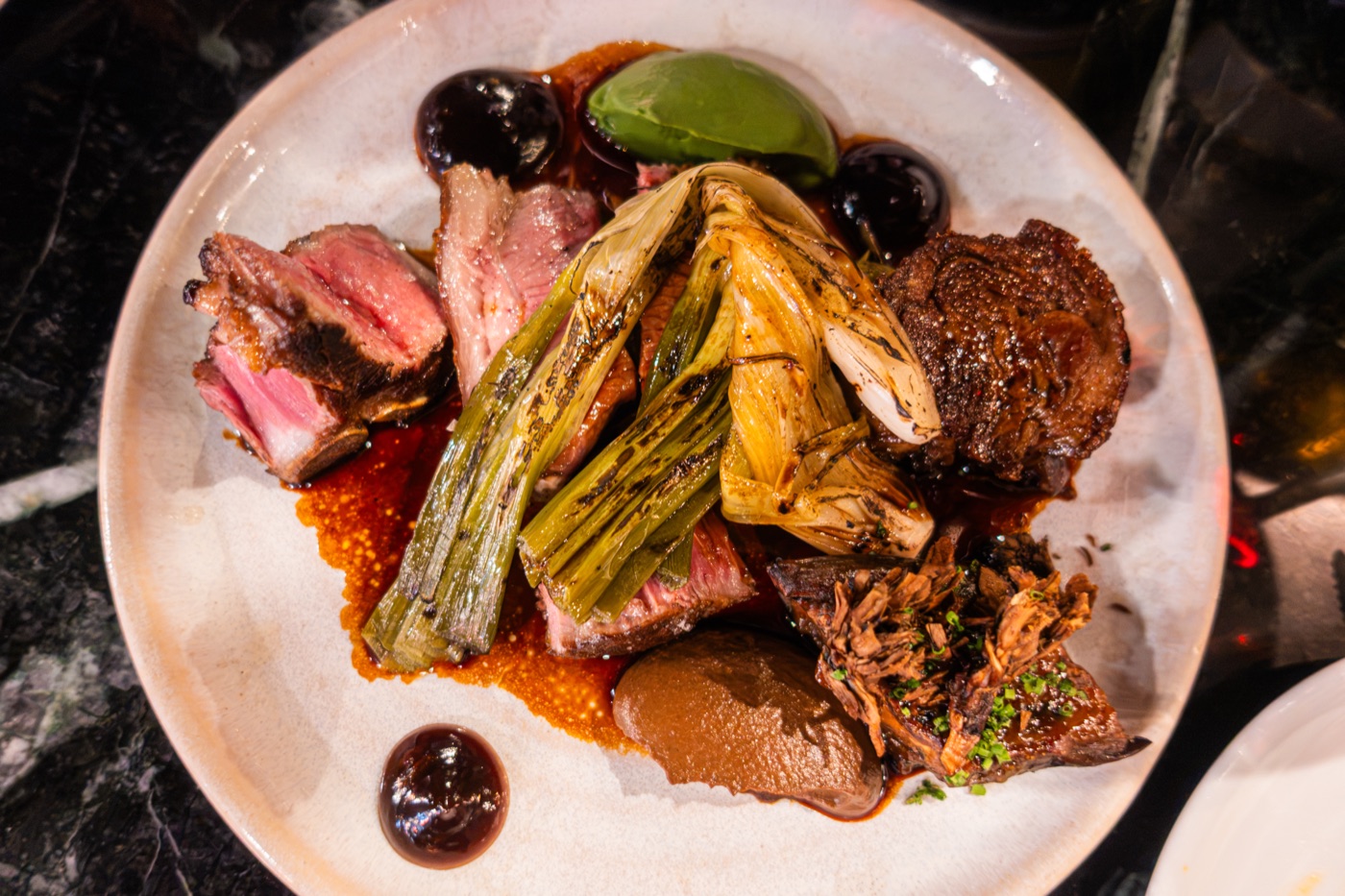 Salt Marsh lamb T-bone. Roasted miso aubergine, pickled onion, braised shoulder.